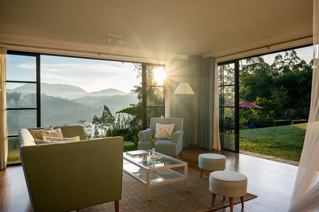 Warleigh lakeview suite lounge with mountain panorama at Camellia Hills, Dickoya