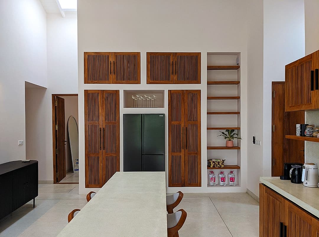 Kitchen cupboards and pantry with timber joinery at Salt and Stone, Ahangama, Koggala, Sri Lanka