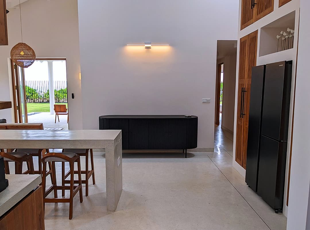 Living area with desk and Indian Ocean view at Salt and Stone, Ahangama, Sri Lanka