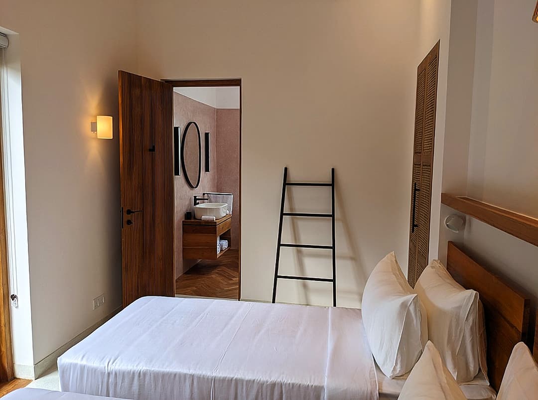 Twin bedroom viewed from doorway at Salt and Stone, Ahangama, Koggala, Sri Lanka