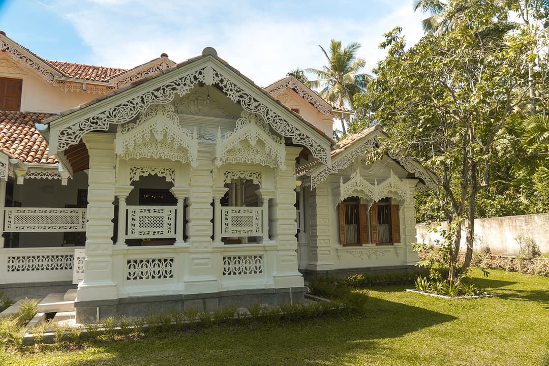 Island Villa Ahangama restored walauwa facade with manicured lawn, Ahangama, Sri Lanka