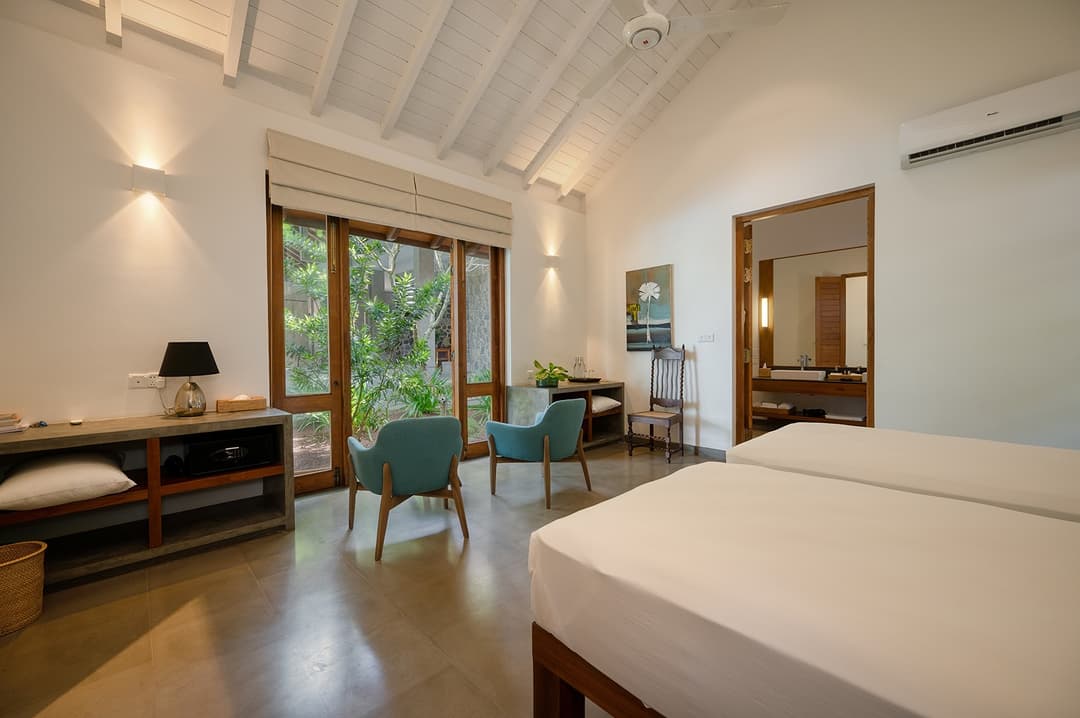 Wide king bedroom with garden doors at Kirana Villa, Bentota, Sri Lanka