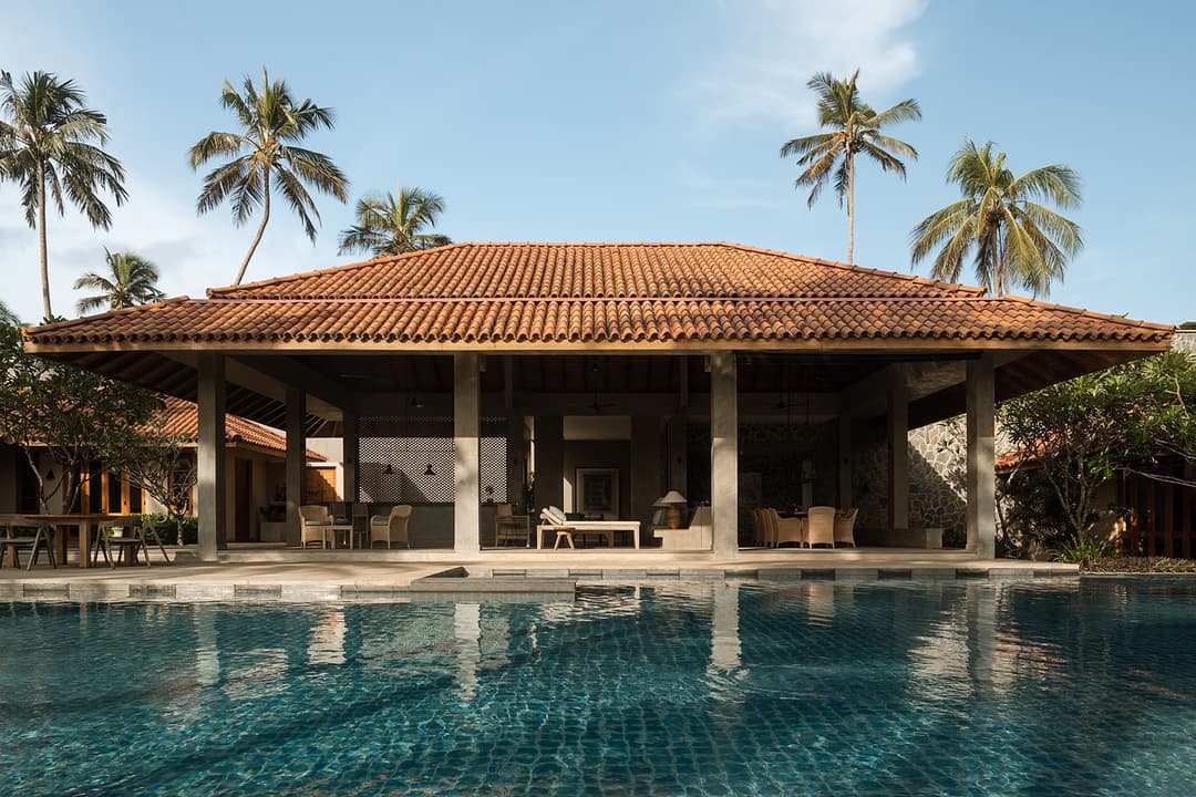 Kirana Villa Bentota exterior with pool, tiled roof and coconut palms, Sri Lanka
