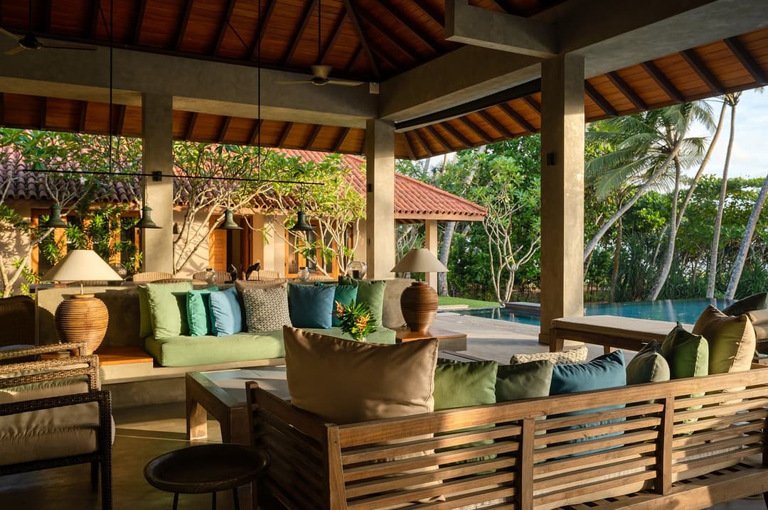 Living pavilion with pool and garden beyond at Kirana Villa, Bentota, Sri Lanka