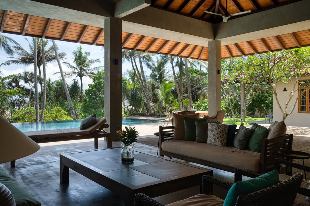 Pool pavilion seating area with garden at Kirana Villa, Bentota, Sri Lanka