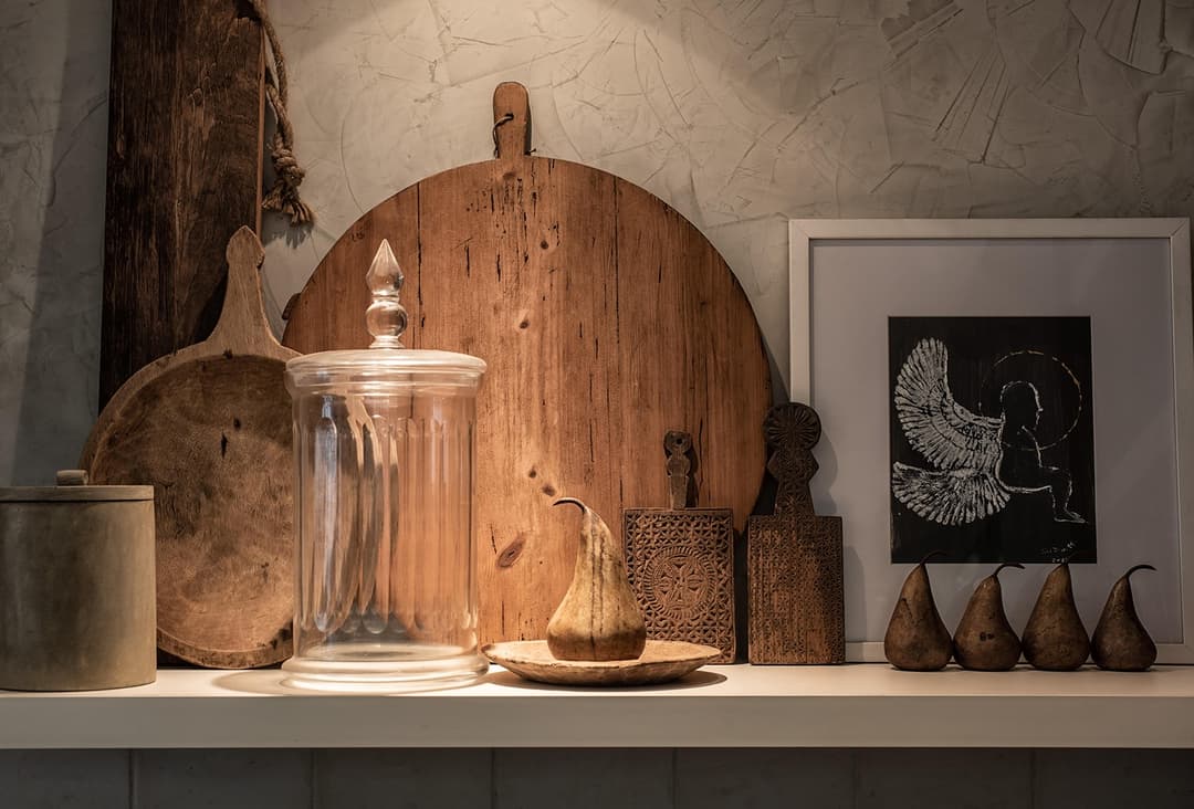 Kitchen detail with wooden paddle, ceramic bowl and artwork, No. 77 Leyn Baan, Galle Fort