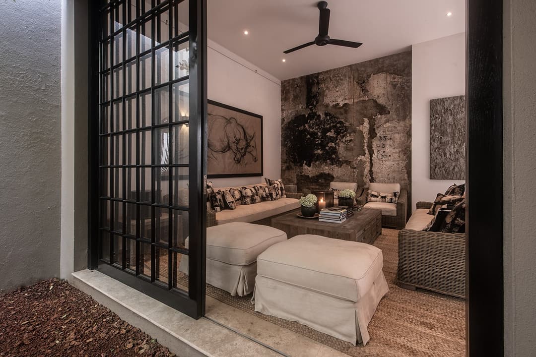 Bedroom with steel frame windows and cream lighter tones, No. 77 Leyn Baan, Galle Fort