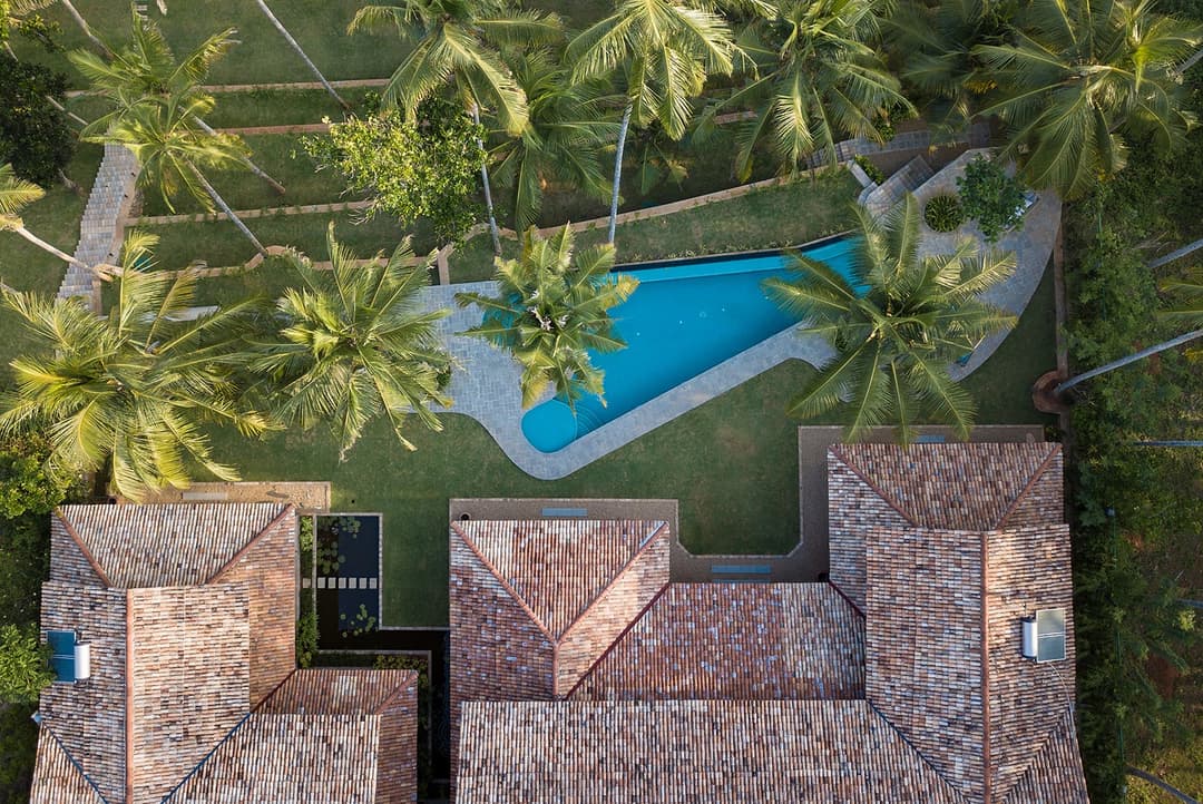 Abiman Dickwella aerial overhead view of villa, pool and tropical garden, Sri Lanka