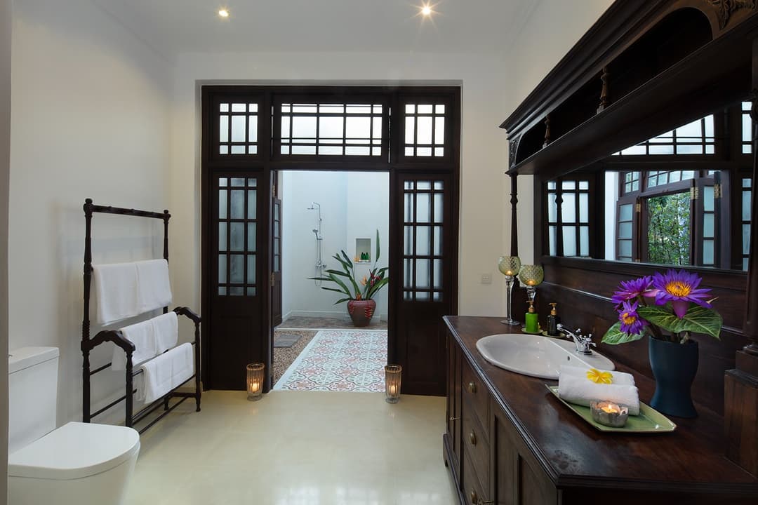 Dark timber bathroom interior at Abiman, Dickwella, Sri Lanka