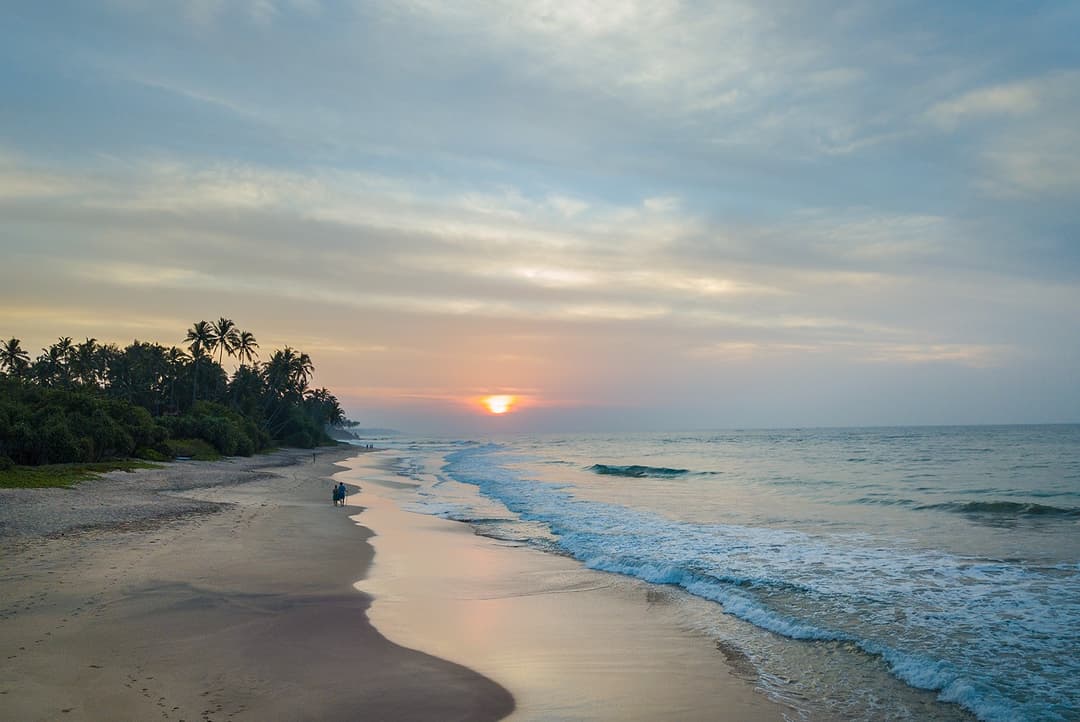 Abiman Dickwella beach and coastline at sunset with Indian Ocean, Sri Lanka