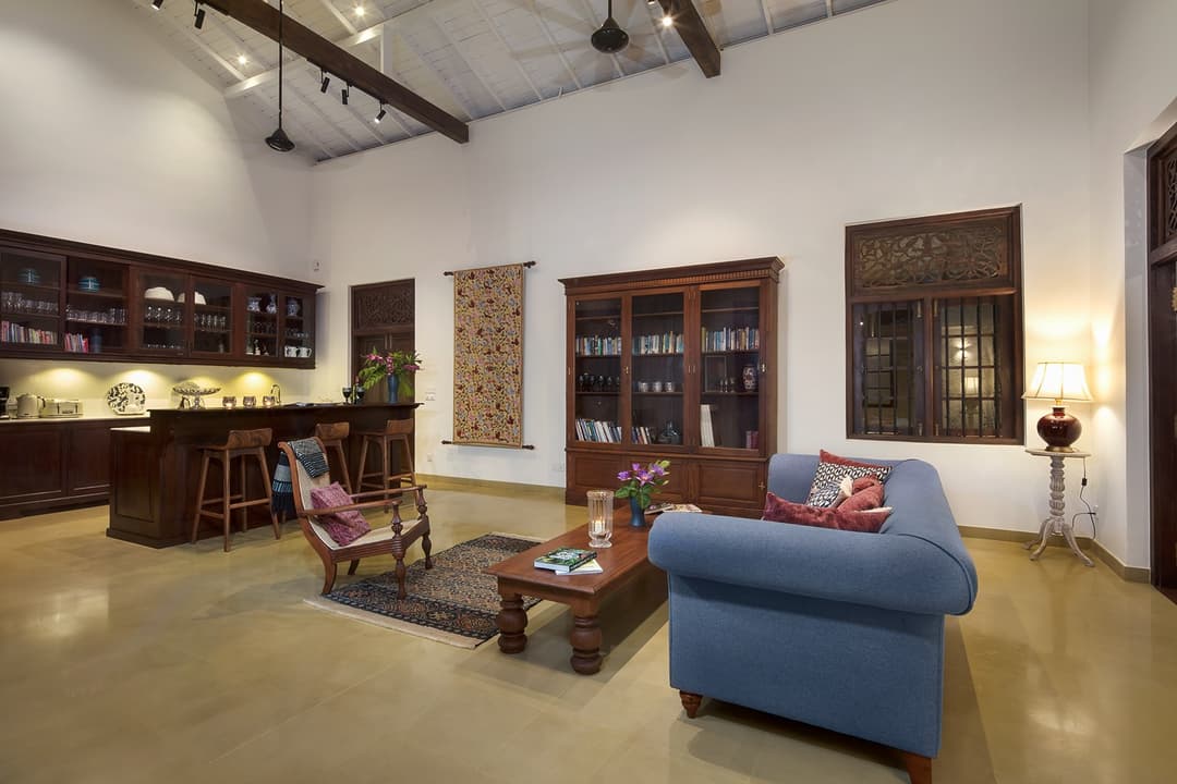 Interior bar and living area with timber shelving at Abiman, Dickwella, Sri Lanka