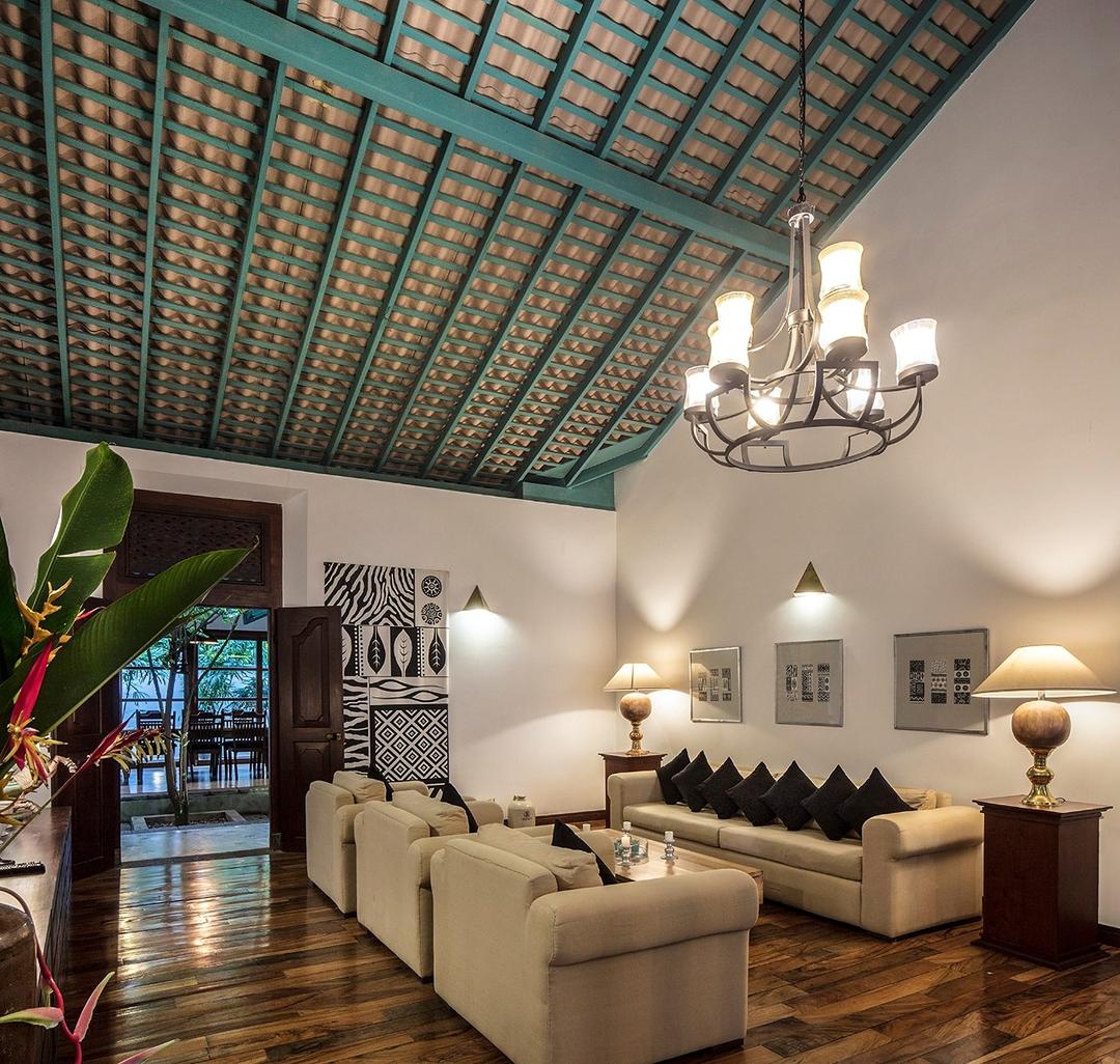 Living room ornate tiled ceiling and chandelier, Magalla Casa