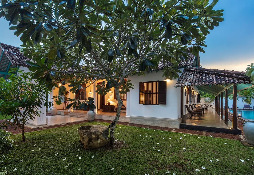 Courtyard with tree at dusk, Magalla Casa Galle
