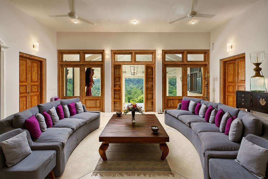 Living area wide with magenta sofas, Divine Villa Talpe