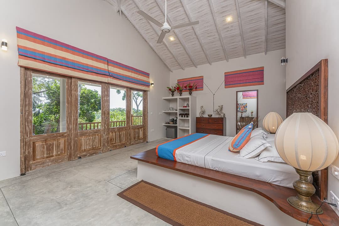 Pavilion Room bed and view, The Divine Villa Talpe