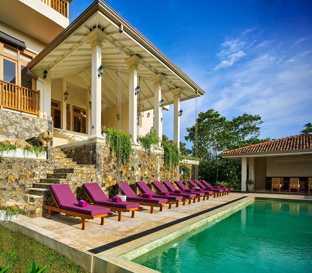 Pool deck angled with villa, The Divine Villa Talpe