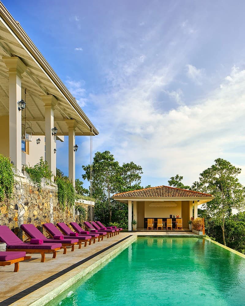 Pool deck frontal with loungers, The Divine Villa Talpe