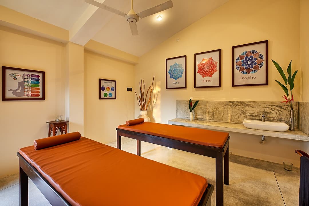 Spa room with massage table, The Divine Villa Talpe