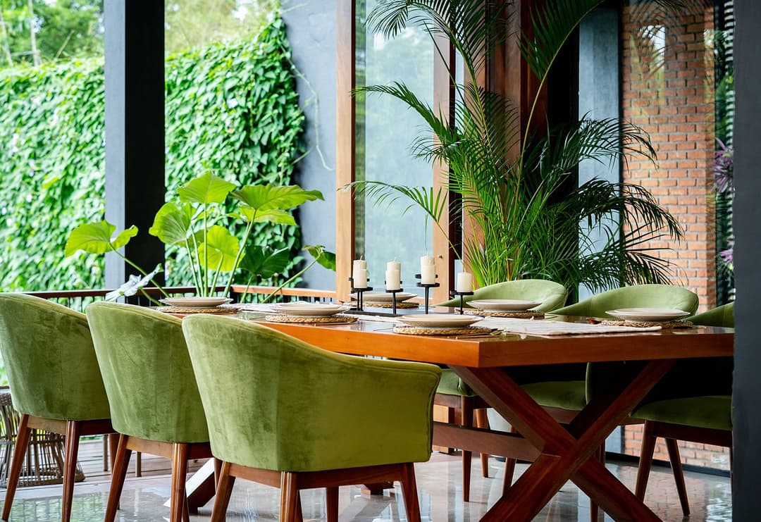 Dining area with green chairs, Kurokawa Kalutara