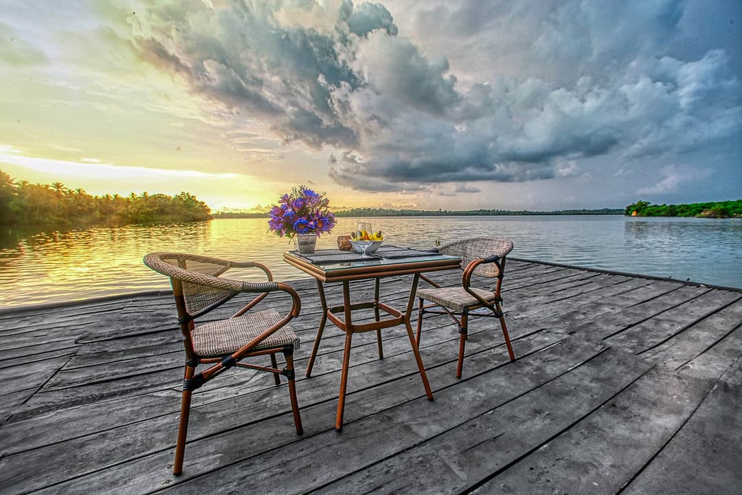 Dining deck at sunset on jetty, The Niche Hikkaduwa