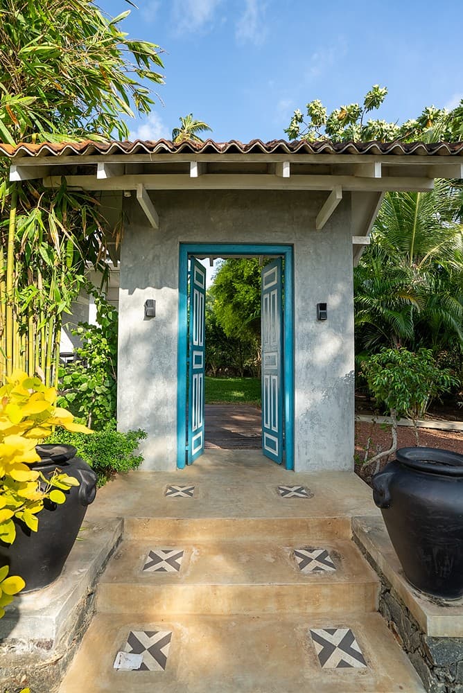 Turquoise entrance door, The Niche Hikkaduwa villa