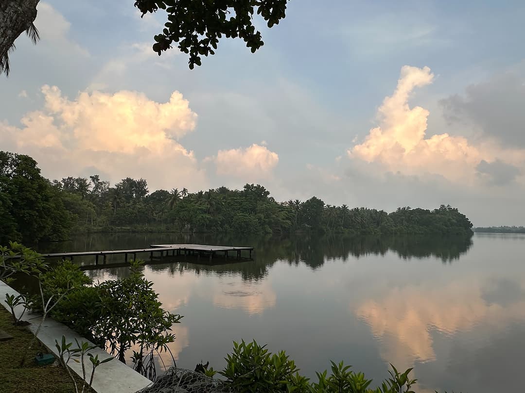 Exterior deck with river at dusk, The Niche Hikkaduwa