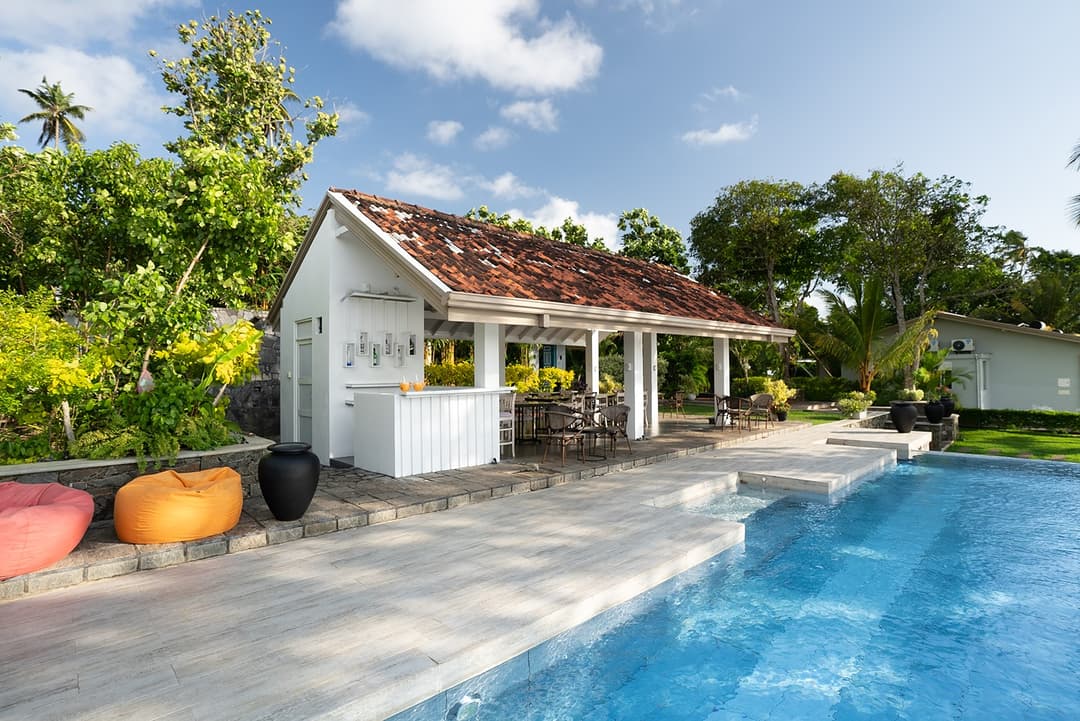 Pool with red tile roof bungalow, The Niche Hikkaduwa
