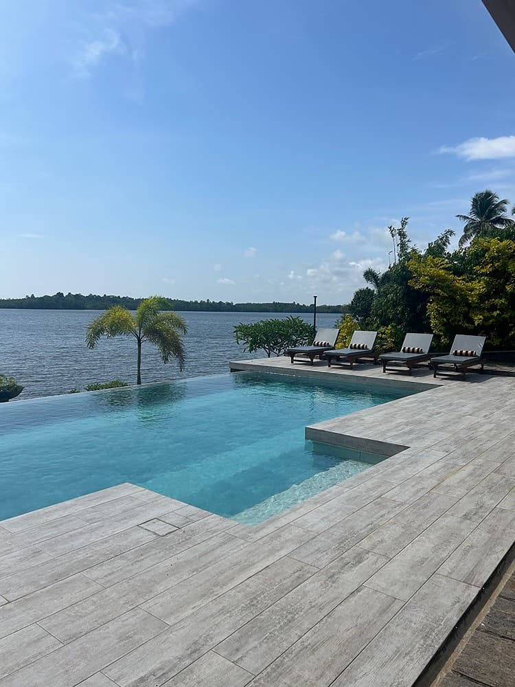 Pool view wide with river, The Niche Hikkaduwa villa