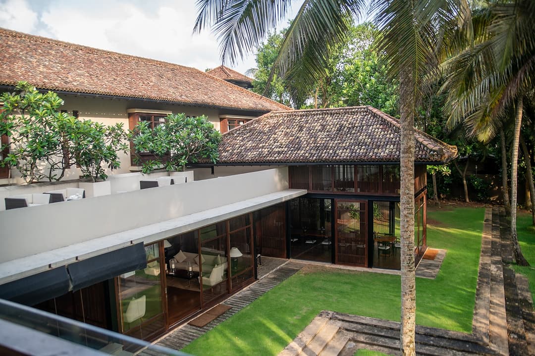 Aerial view of villa buildings and pool, Villa by CC