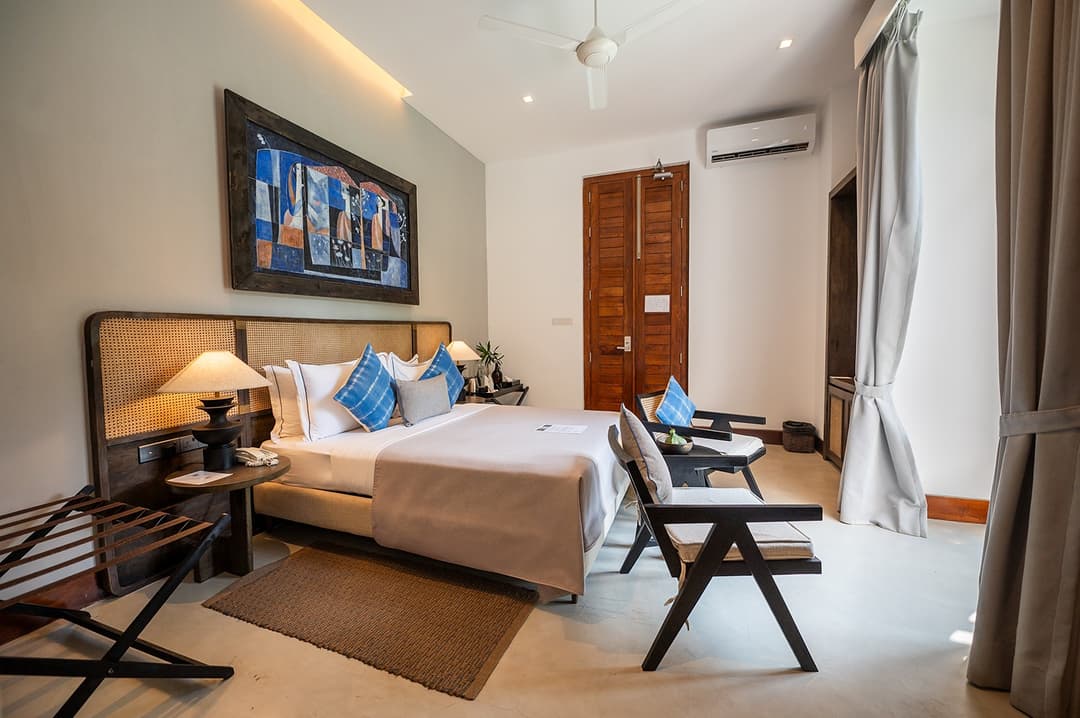 Bedroom with blue cushions wide, The Villa by CC Wadduwa