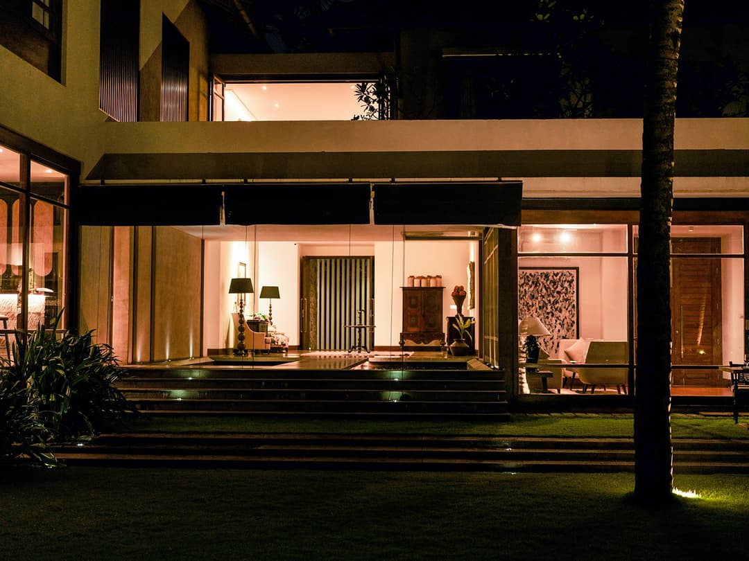 Entrance pathway lit at night, The Villa by CC Wadduwa