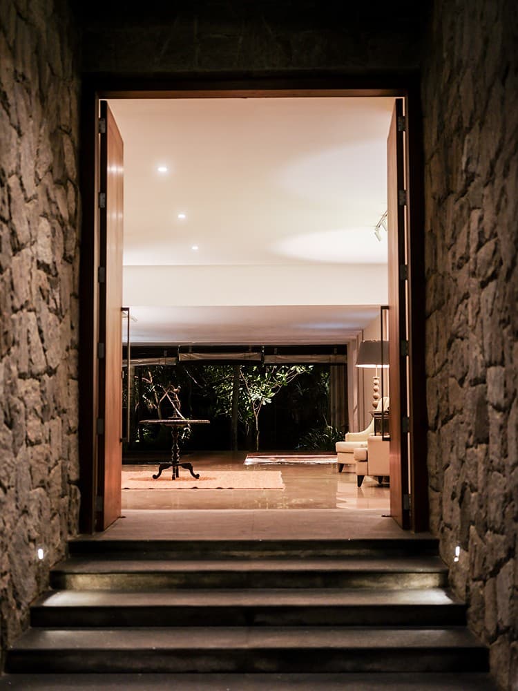Stone entrance framing view, The Villa by CC Wadduwa