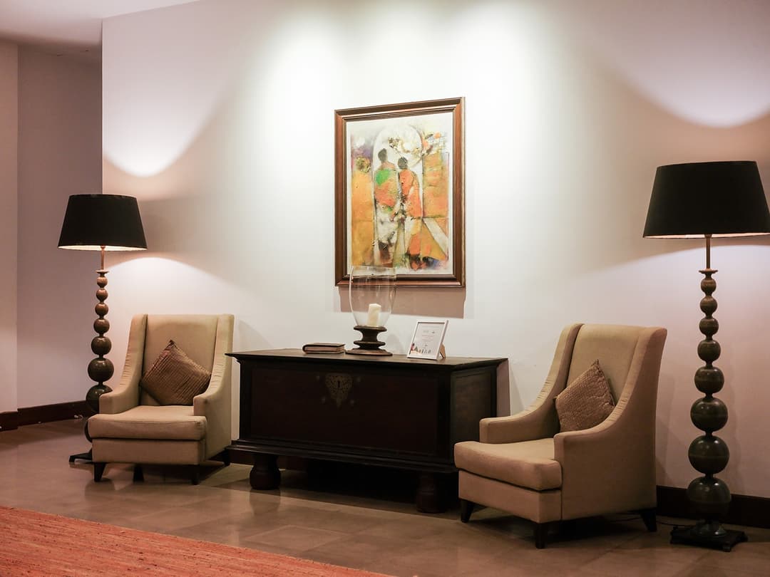 Living room with lamp and armchair, The Villa by CC Wadduwa