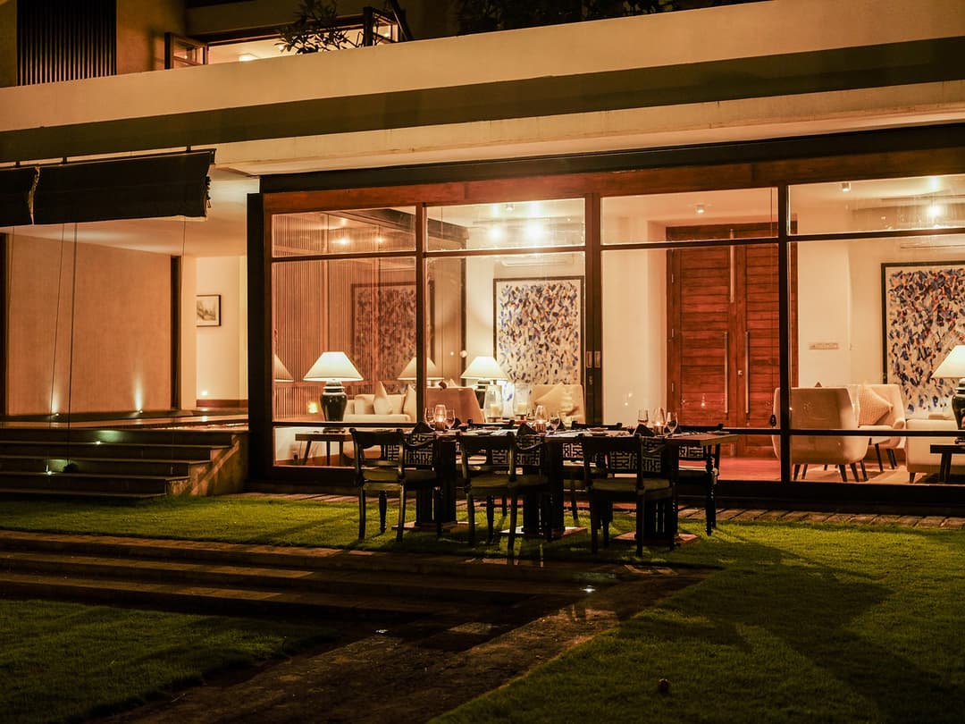 Outdoor dining evening lit, The Villa by CC Wadduwa