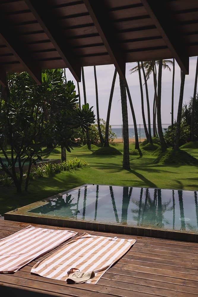 Pool deck wide with palms, The Villa by CC Wadduwa