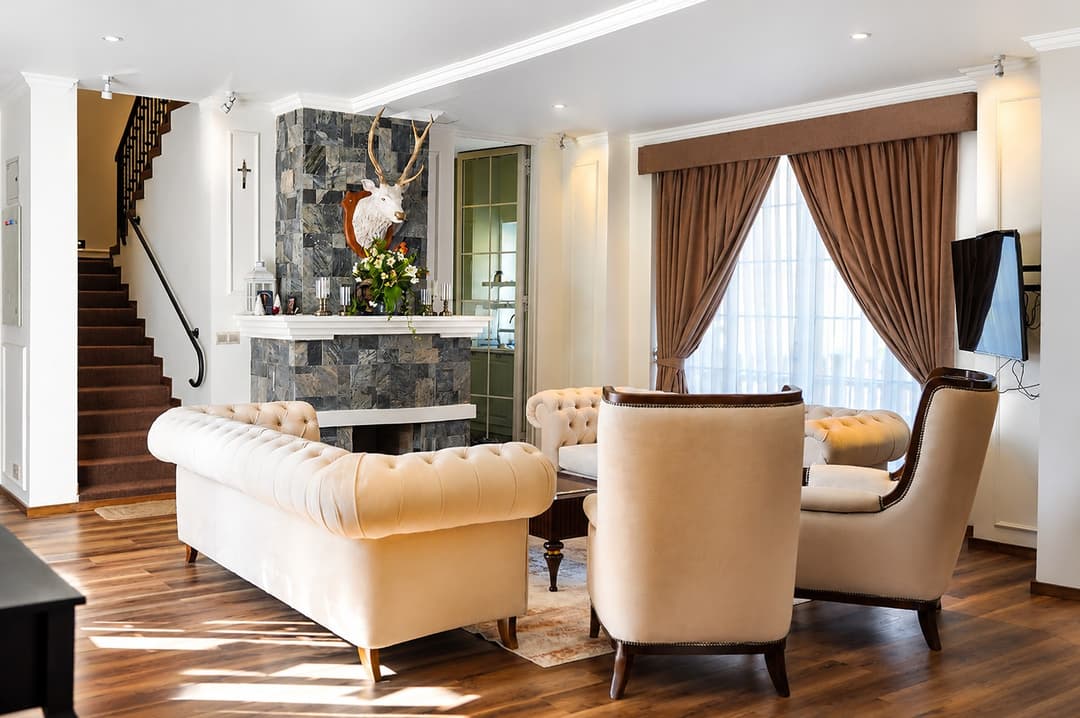 Living room fireplace and cream sofas, The Mystique Nuwara Eliya