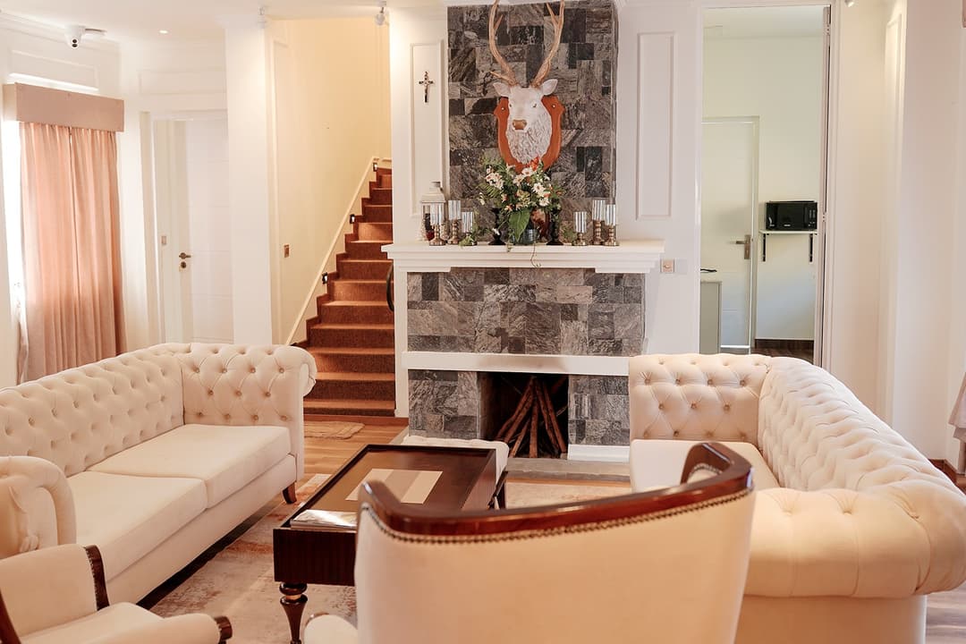 Drawing room with fireplace and sofa, The Mystique Nuwara Eliya