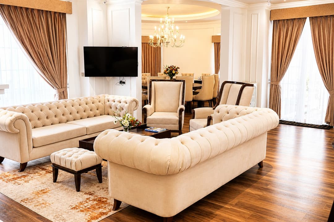 Bedroom sitting area with cream sofa, The Mystique