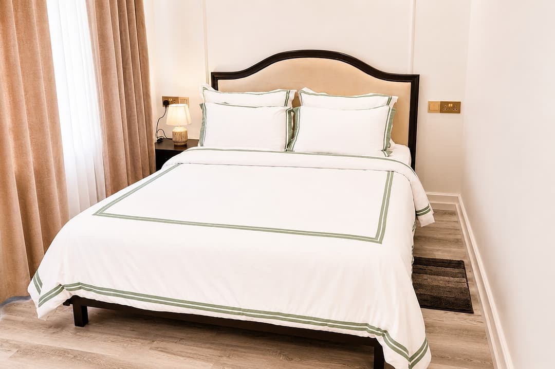 Bedroom king bed with white linen, The Mystique Nuwara Eliya