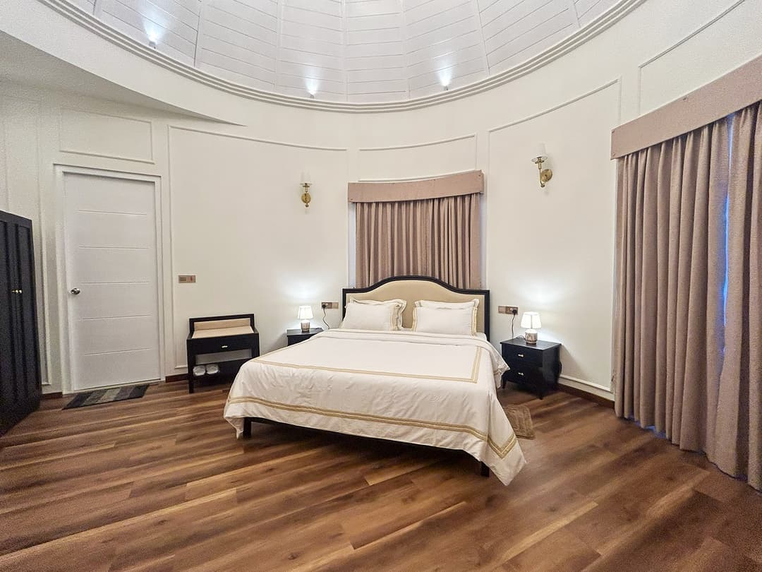 Bedroom dark wood floor king bed, The Mystique Nuwara Eliya
