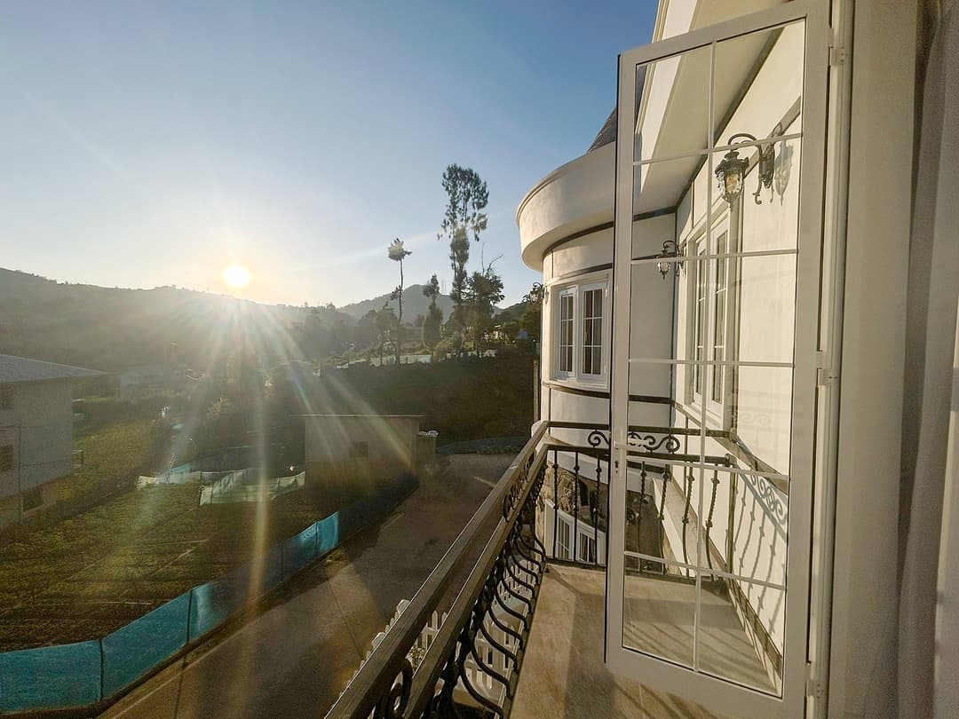 Balcony at dawn with sun flare, The Mystique Nuwara Eliya