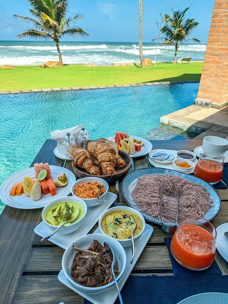 Poolside Sri Lankan food spread, Candella House Talpe
