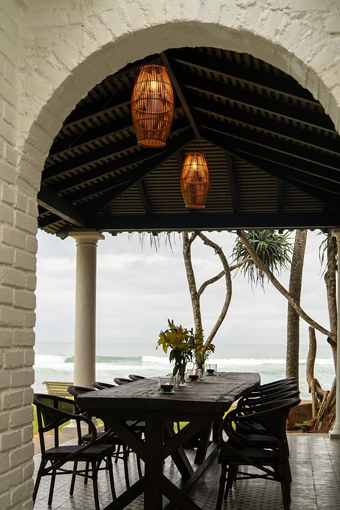 Outdoor dining pavilion with lantern, Candella House Talpe