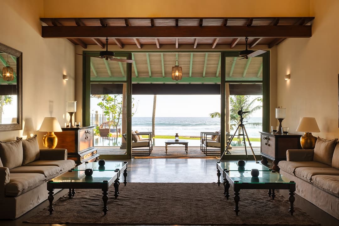 Living room arch with ocean view, Candella House Talpe