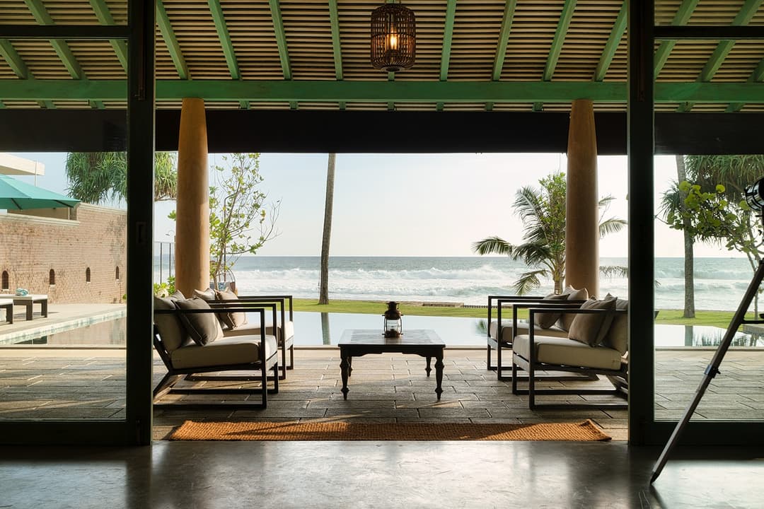 Covered terrace with beach view, Candella House Talpe