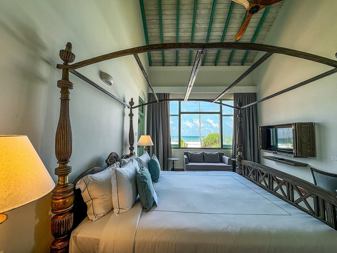 Four-poster bedroom with sea view, Candella House Talpe