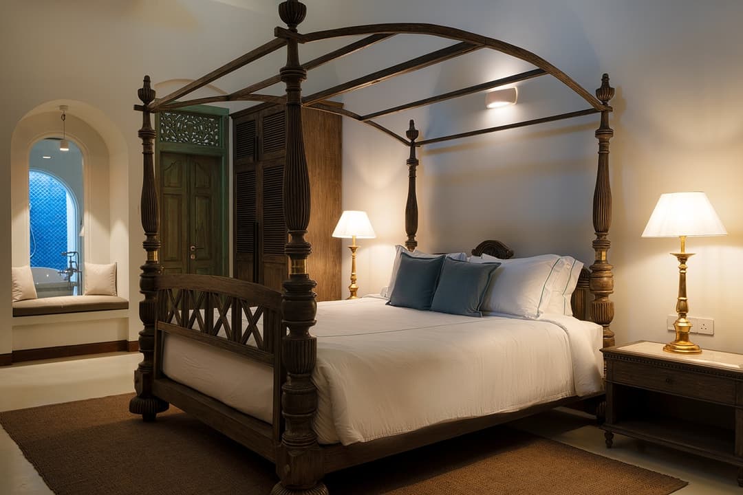 Four-poster bedroom with blue lamps, Candella House Talpe