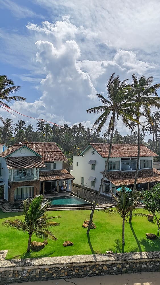 Aerial villa with palms angle, Candella House Talpe
