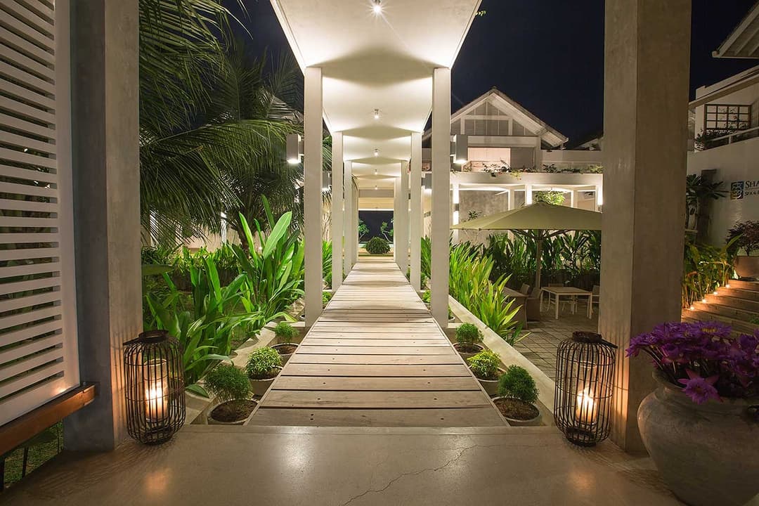 Corridor lit with palms, Sri Sharavi Beach Villas Mirissa