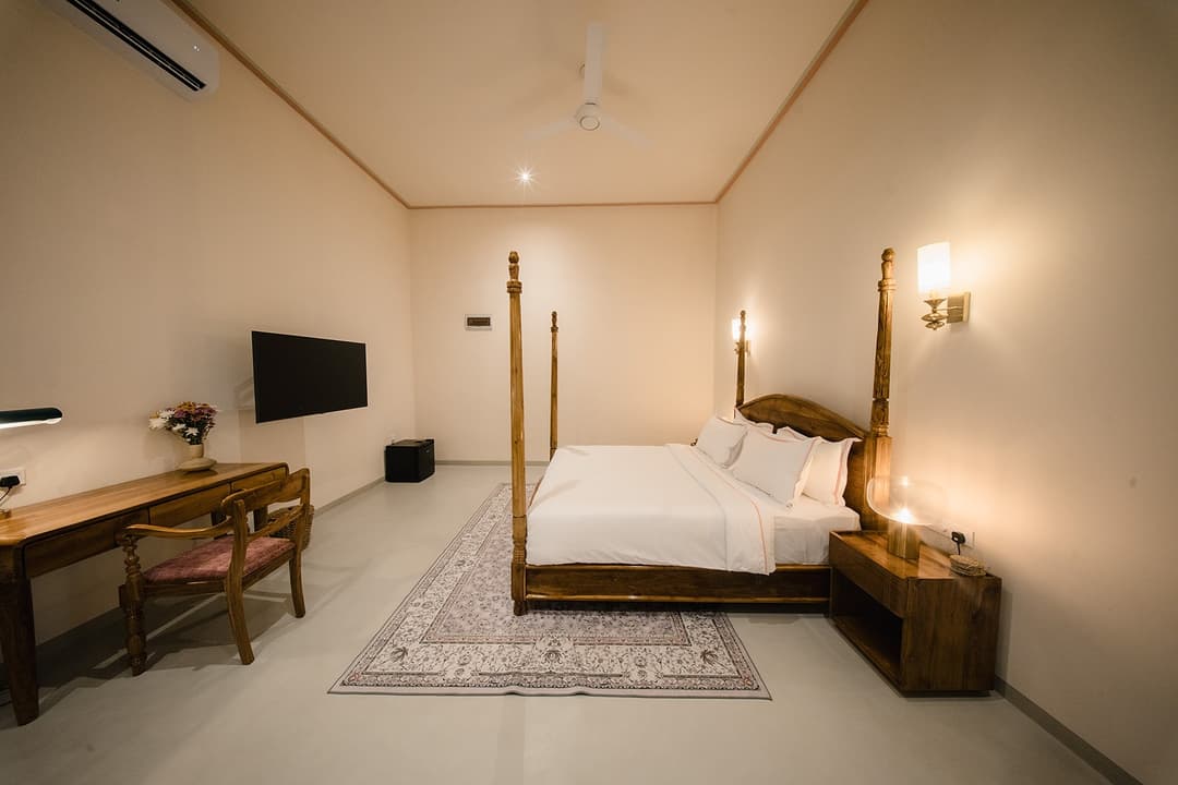 Four-poster room green neutral palette, Padmaraga Galle Fort